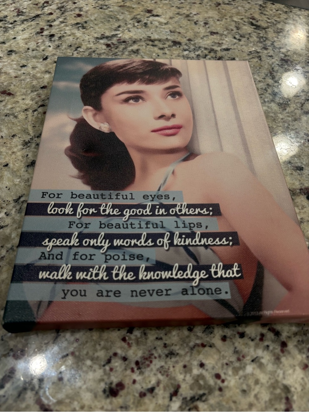 Audrey Hepburn quote on printed canvas wall
hanging